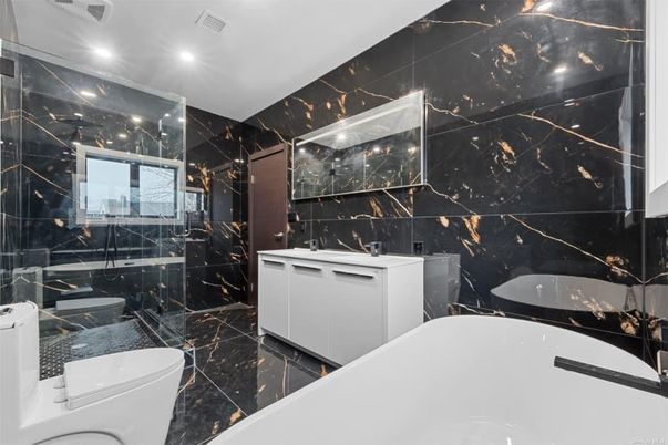 Bathroom, Dual Sink Vanities, Glass Shower, Interior, Marble, Marble Walls, Recessed Lighting