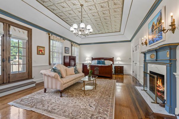 Bedroom, Chandelier, Fireplace, Interior, Wood Texture Flooring