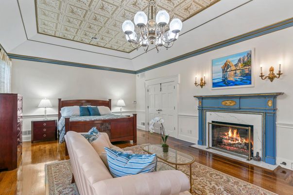 Bedroom, Chandelier, Fireplace, Interior, Wood Texture Flooring