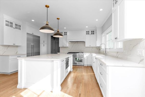Interior, Kitchen, Marble Walls, Pendant Lights, Recessed Lighting, Stainless Steel Appliances, Wood Texture Flooring