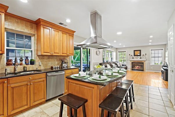 Fireplace, Interior, Kitchen, Living room, Recessed Lighting, Stainless Steel Appliances, Wood Texture Flooring