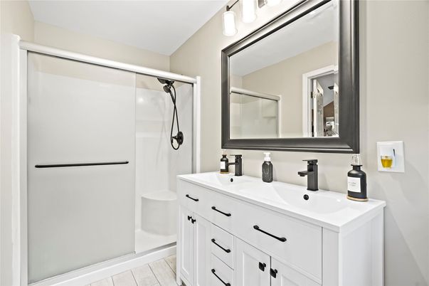 Bathroom, Dual Sink Vanities, Glass Shower, Interior, Wood Texture Flooring
