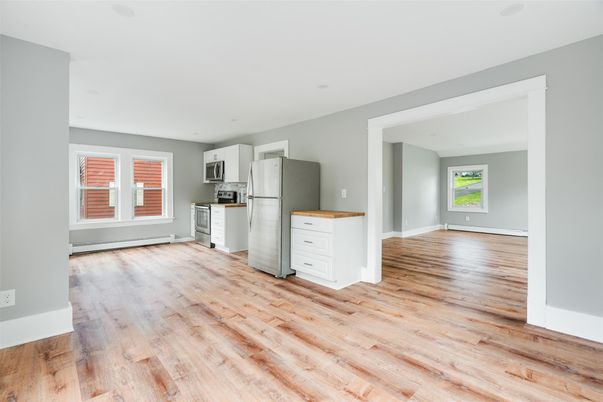 Empty room, Interior, Kitchen, Stainless Steel Appliances, Wood Texture Flooring