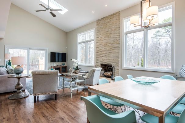 Dining room, Fireplace, Interior, Living room, Recessed Lighting, Stone Walls, Wood Texture Flooring