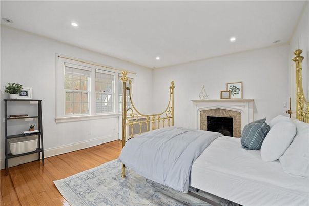Bedroom, Fireplace, Interior, Recessed Lighting, Wood Texture Flooring