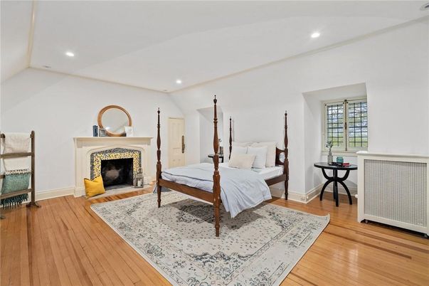 Bedroom, Fireplace, Interior, Recessed Lighting, Wood Texture Flooring