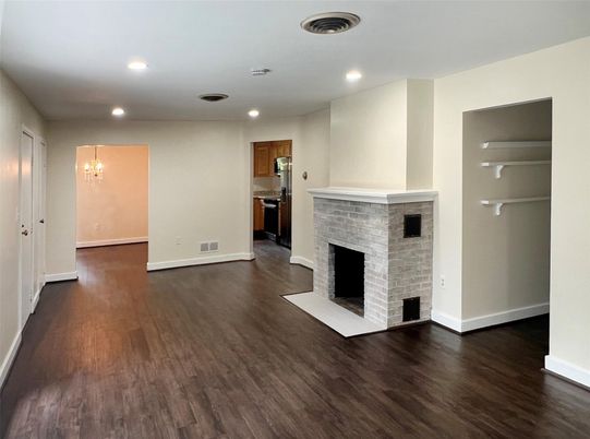 Empty room, Fireplace, Interior, Kitchen, Pendant Lights, Recessed Lighting, Wood Texture Flooring