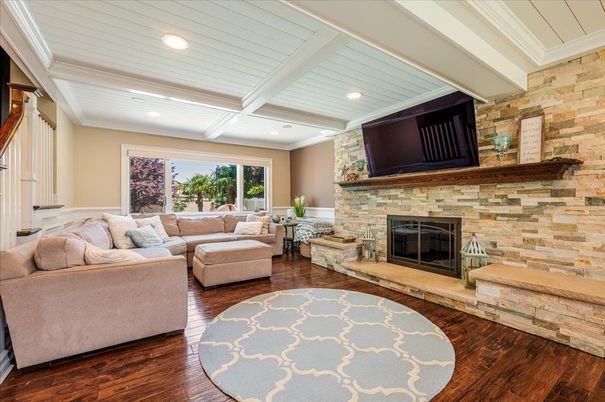 Fireplace, Interior, Living room, Recessed Lighting, Stone Walls, Wood Texture Flooring