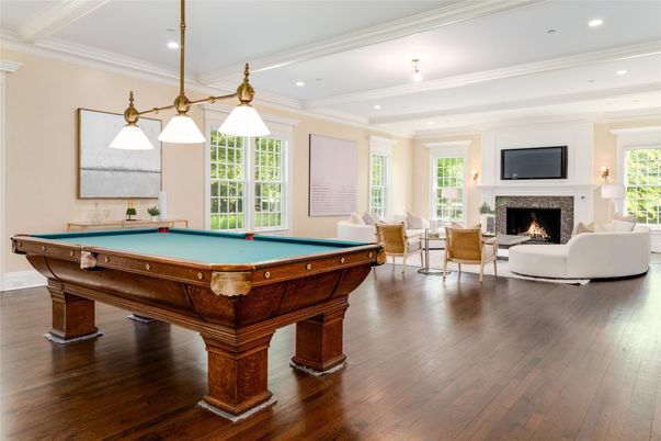 Billiard Table, Fireplace, Game Room, Interior, Living room, Pendant Lights, Recessed Lighting, Wood Texture Flooring