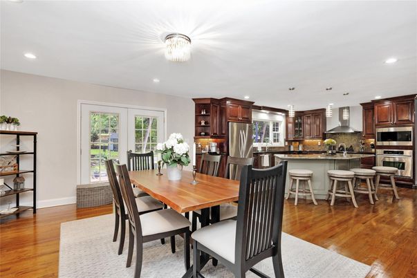 Dining room, Interior, Kitchen, Pendant Lights, Recessed Lighting, Stainless Steel Appliances, Wood Texture Flooring