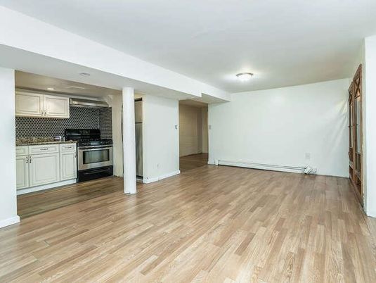 Empty room, Interior, Kitchen, Stainless Steel Appliances, Wood Texture Flooring