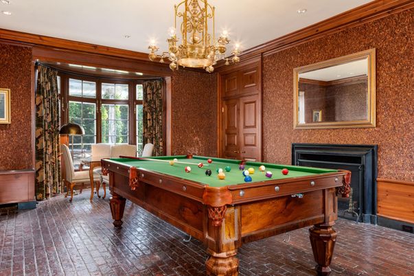 Billiard Table, Chandelier, Fireplace, Game Room, Interior, Recessed Lighting, Wood Texture Flooring