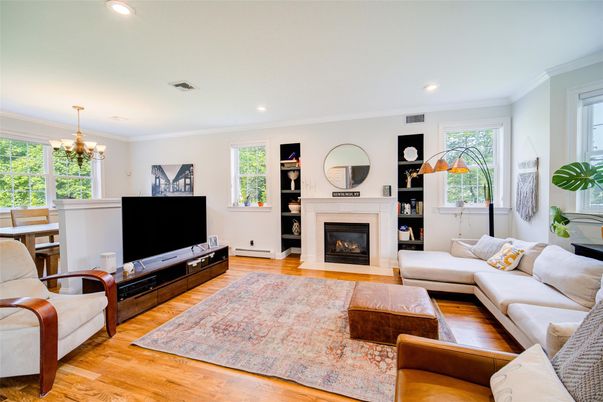Chandelier, Fireplace, Interior, Living room, Recessed Lighting, Wood Texture Flooring