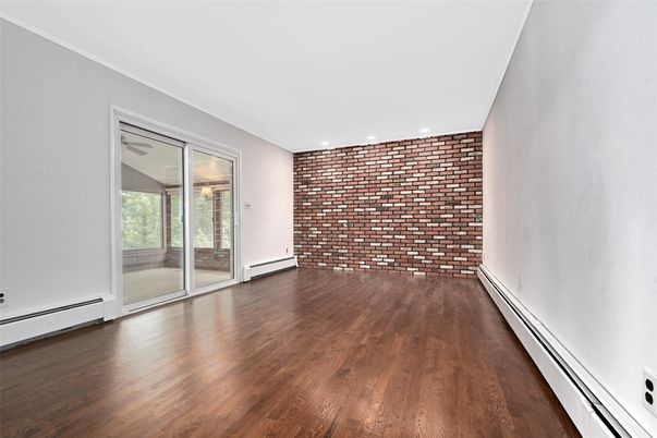 Empty room, Interior, Recessed Lighting, Stone Walls, Wood Texture Flooring