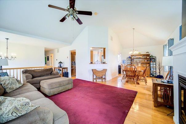 Chandelier, Dining room, Fireplace, Interior, Living room, Pendant Lights, Wood Texture Flooring