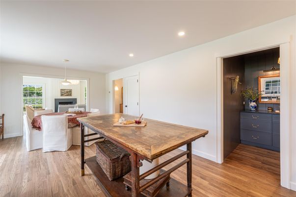 Dining room, Fireplace, Interior, Living room, Pendant Lights, Recessed Lighting, Wood Texture Flooring