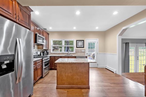 Interior, Kitchen, Recessed Lighting, Stainless Steel Appliances, Wood Texture Flooring