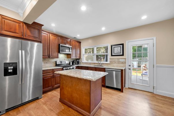 Interior, Kitchen, Recessed Lighting, Stainless Steel Appliances, Wood Texture Flooring