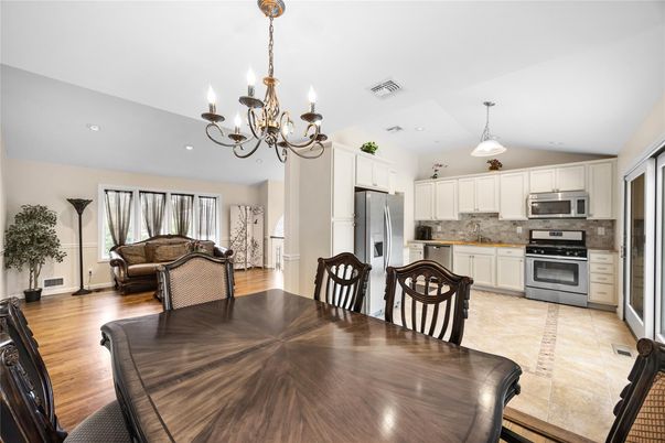 Chandelier, Dining room, Interior, Kitchen, Pendant Lights, Recessed Lighting, Stainless Steel Appliances