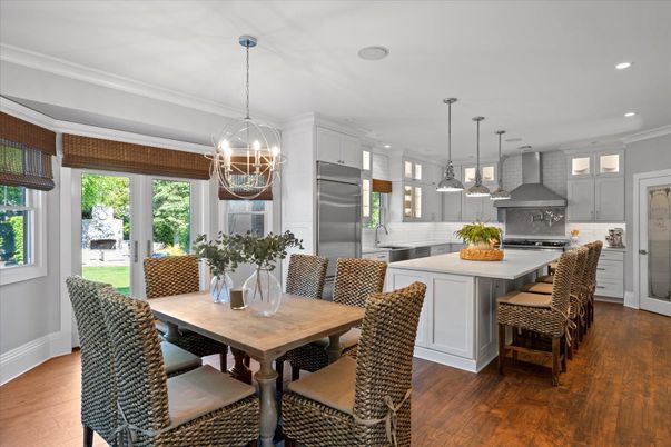 Chandelier, Dining room, Interior, Kitchen, Pendant Lights, Recessed Lighting, Stainless Steel Appliances, Wood Texture Flooring