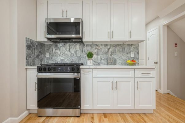 Interior, Kitchen, Marble Walls, Stainless Steel Appliances, Wood Texture Flooring
