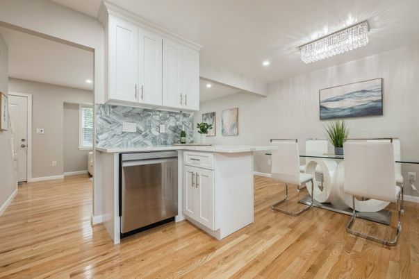 Dining room, Interior, Kitchen, Marble Walls, Recessed Lighting, Stainless Steel Appliances, Wood Texture Flooring