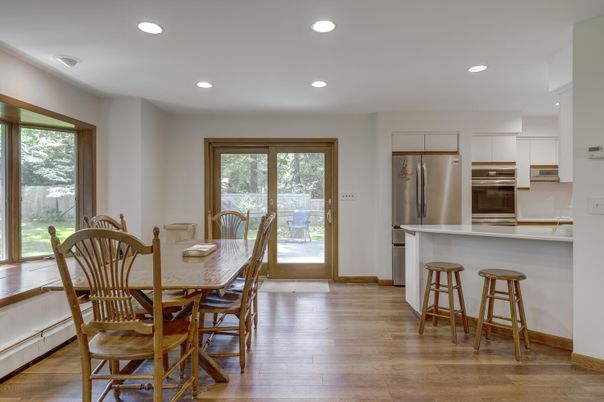 Dining room, Interior, Kitchen, Recessed Lighting, Stainless Steel Appliances, Wood Texture Flooring
