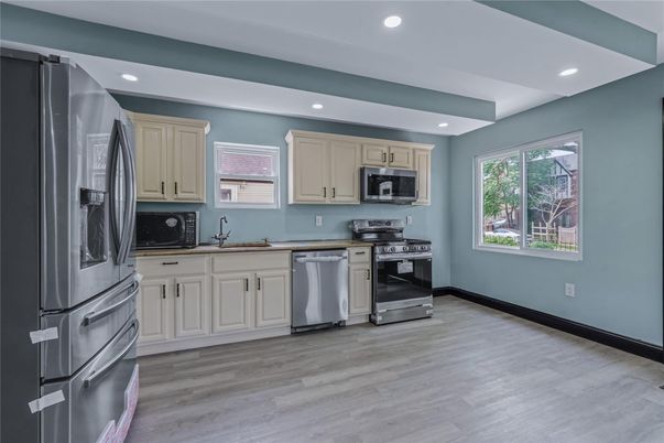 Interior, Kitchen, Recessed Lighting, Stainless Steel Appliances, Wood Texture Flooring