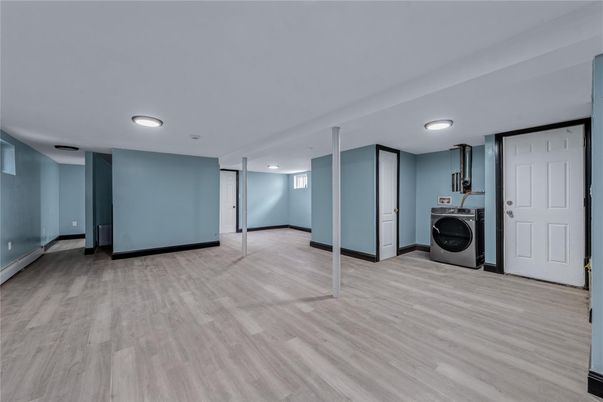 Empty room, Interior, Recessed Lighting, Utility Closets, Washer, Wood Texture Flooring