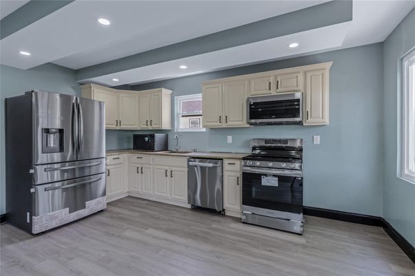 Interior, Kitchen, Recessed Lighting, Stainless Steel Appliances, Wood Texture Flooring