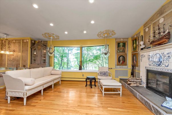 Chandelier, Fireplace, Interior, Living room, Recessed Lighting, Wood Texture Flooring