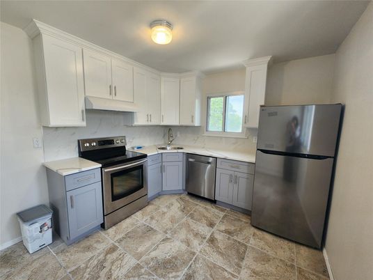 Interior, Kitchen, Marble Walls, Stainless Steel Appliances