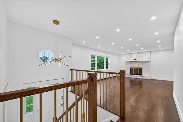 Fireplace, Interior, Pendant Lights, Recessed Lighting, Stone Walls, Wood Texture Flooring