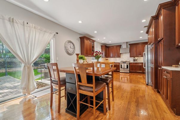 Dining room, Interior, Kitchen, Recessed Lighting, Stainless Steel Appliances, Wood Texture Flooring