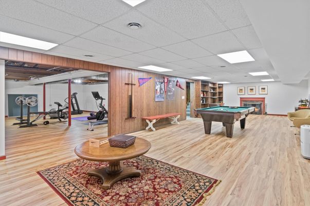 Billiard Table, Fitness Equipment, Game Room, Interior, Recessed Lighting, Wood Texture Flooring, Wooden Walls