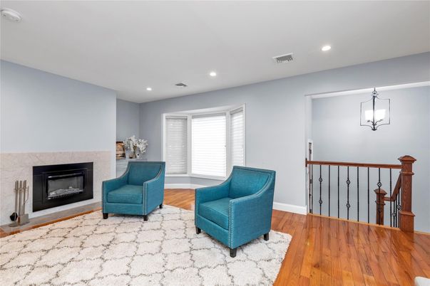 Fireplace, Interior, Pendant Lights, Recessed Lighting, Wood Texture Flooring