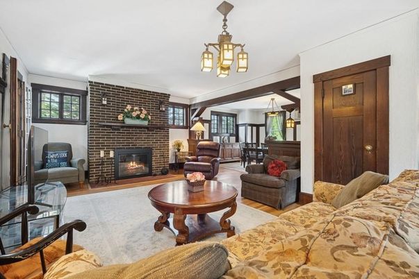 Dining room, Fireplace, Interior, Living room, Pendant Lights, Stone Walls, Wood Texture Flooring
