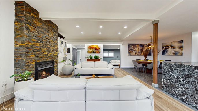 Fireplace, Interior, Living room, Recessed Lighting, Stone Walls, Wood Texture Flooring