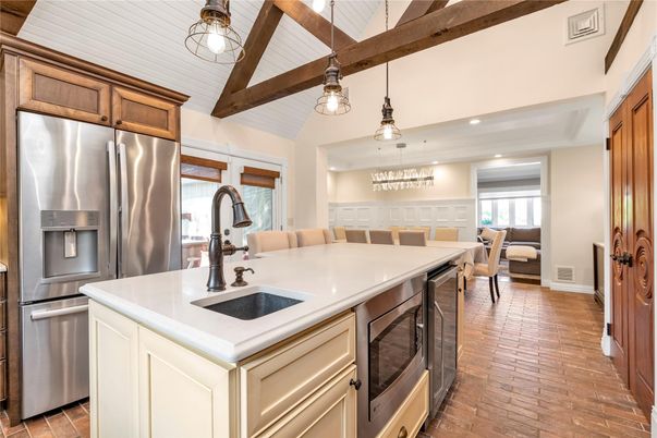 Dining room, Interior, Kitchen, Pendant Lights, Recessed Lighting, Stainless Steel Appliances, Wooden Beams, Wood Texture Flooring