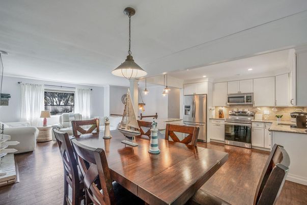 Dining room, Interior, Kitchen, Living room, Pendant Lights, Recessed Lighting, Stainless Steel Appliances, Wood Texture Flooring