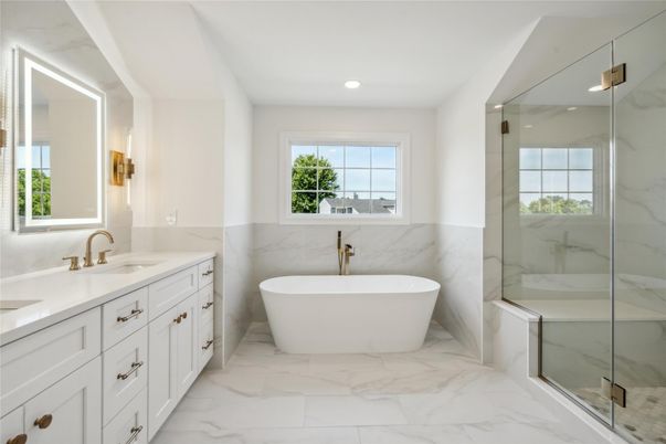 Bathroom, Dual Sink Vanities, Free Standing Baths, Glass Shower, Interior, Marble, Marble Walls, Recessed Lighting