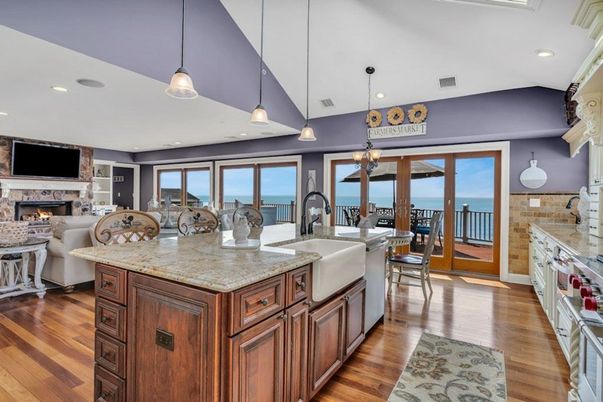 Dining room, Fireplace, Interior, Kitchen, Living room, Pendant Lights, Recessed Lighting, Water, Wood Texture Flooring
