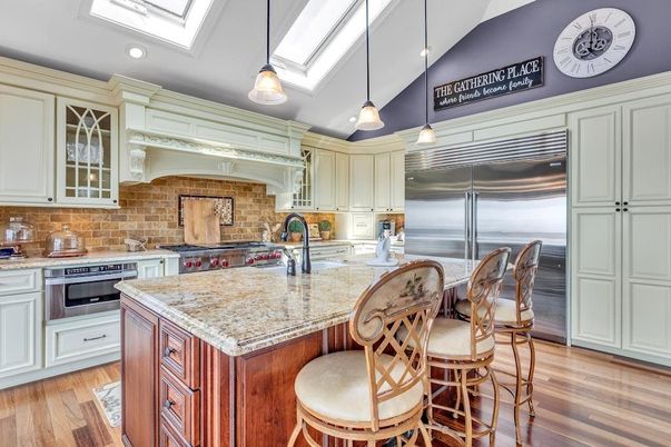 Interior, Kitchen, Pendant Lights, Recessed Lighting, Stainless Steel Appliances, Stone Walls, Wood Texture Flooring
