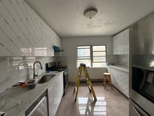 Interior, Kitchen, Marble Walls, Stainless Steel Appliances