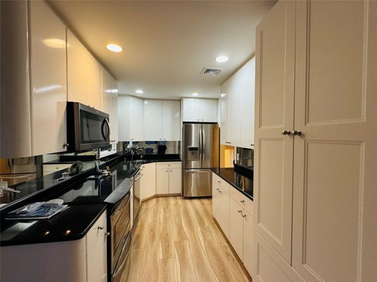 Interior, Kitchen, Recessed Lighting, Stainless Steel Appliances, Wood Texture Flooring
