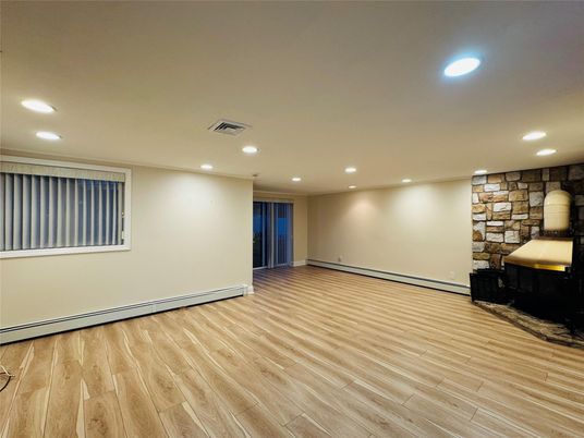 Empty room, Interior, Recessed Lighting, Stone Walls, Wood Texture Flooring