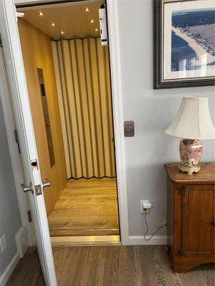 Elevator, Interior, Recessed Lighting, Wood Texture Flooring