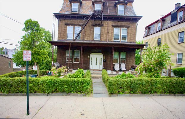 Exterior, Facade, Brick Facade, American Foursquare