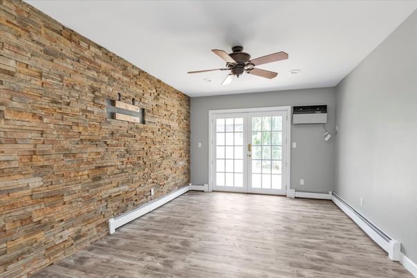 Empty room, Interior, Recessed Lighting, Stone Walls, Wood Texture Flooring