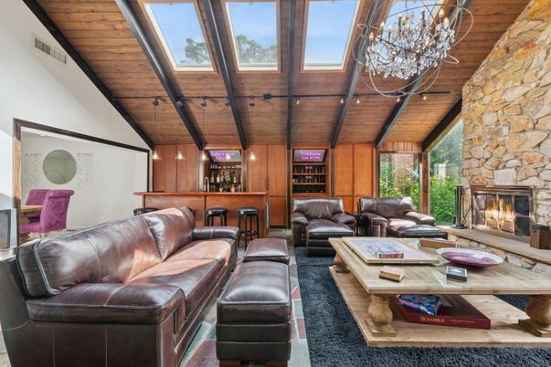 Chandelier, Fireplace, Interior, Living room, Stone Walls, Wooden Beams, Wooden Ceilings, Wooden Walls